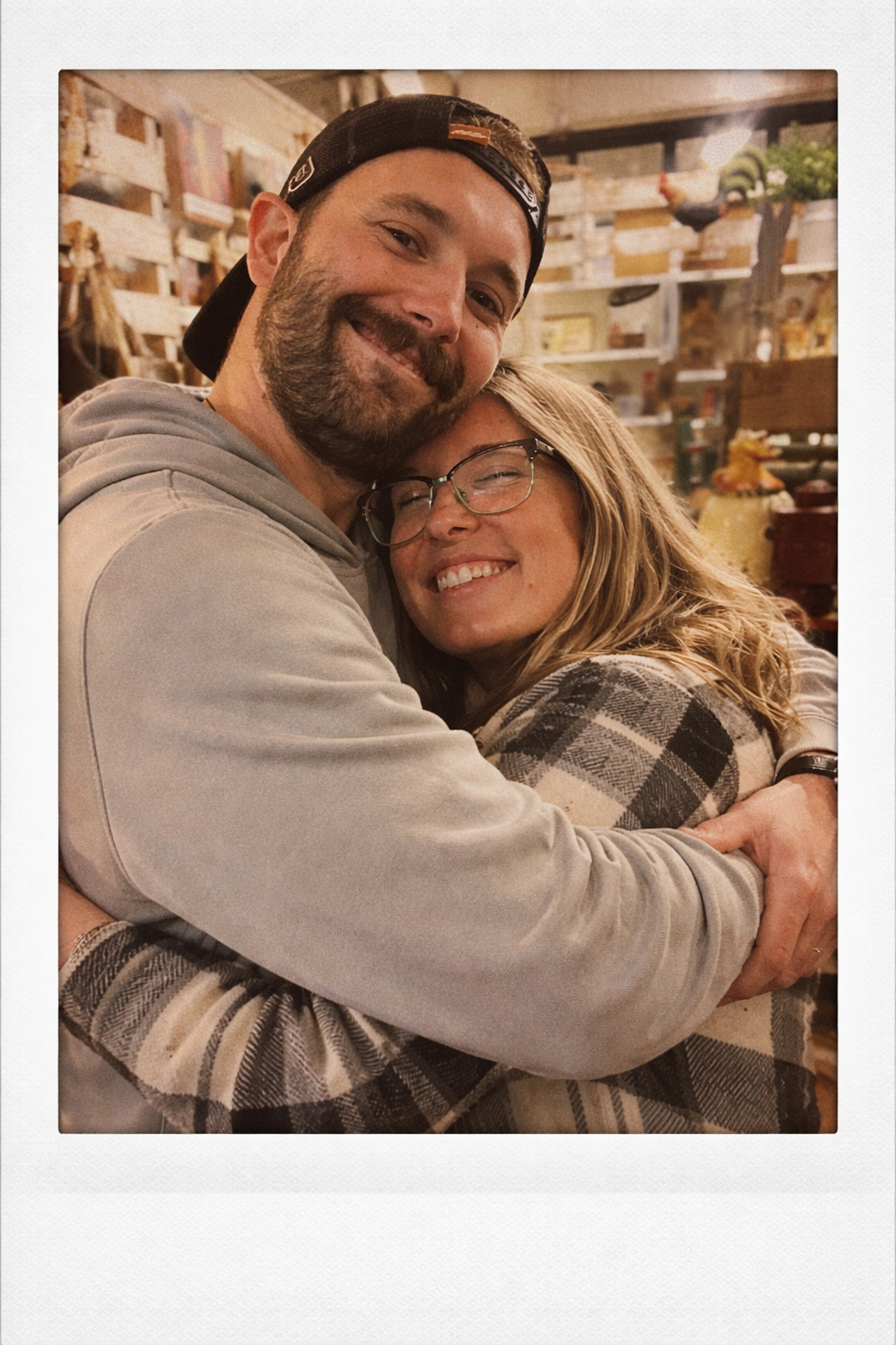 Evan Watz and Jamie Watz smiling and embracing — Jamie Watz and Evan Watz